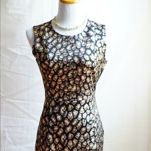 Óliviá Matheus Women’s Dress black and gold colors.